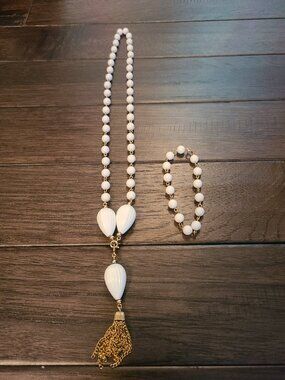 Vintage 1980s necklace and bracelet set white beads with gold coloured chain.
